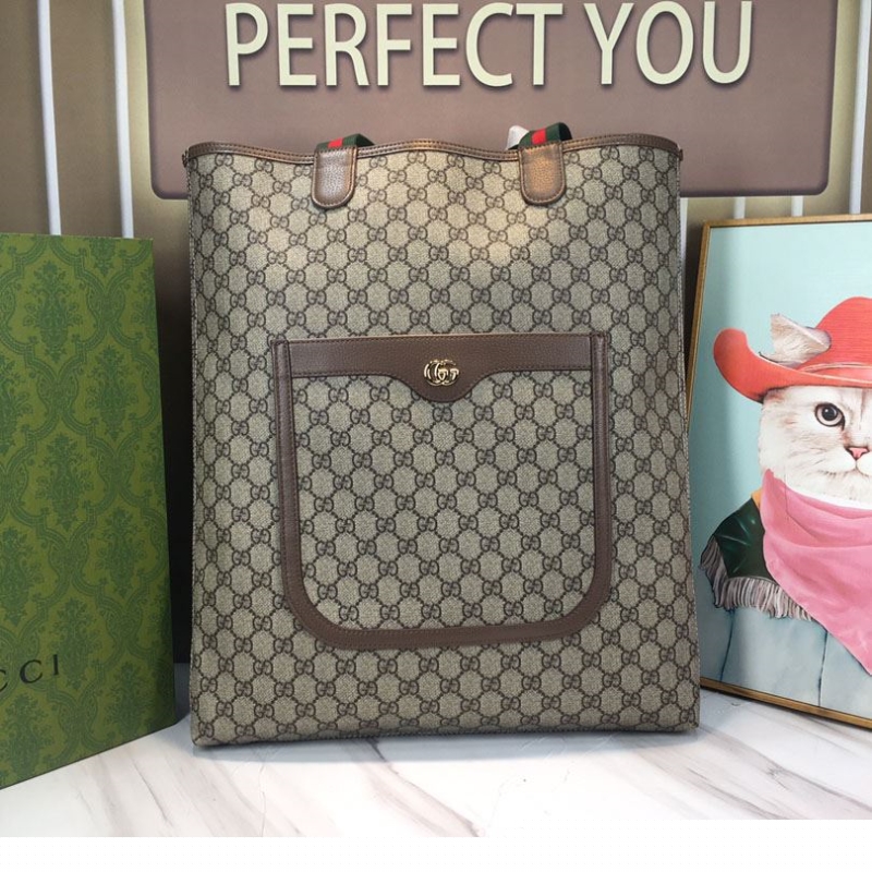 G*u*i shopping bags